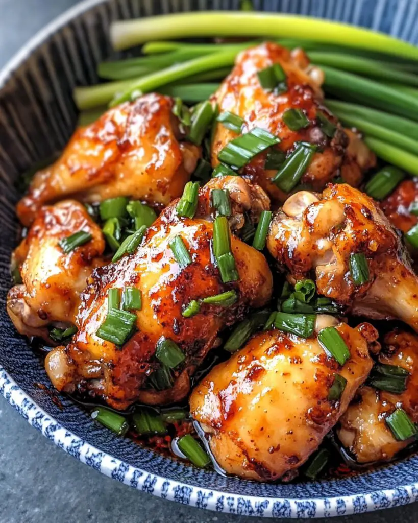 Savor the flavors of this Chinese scallion chicken thigh recipe, featuring tender chicken thighs stir-fried in a delicious Asian sauce enriched with fresh scallions. This quick and easy recipe is not only budget-friendly but also perfect for a healthy dinner idea. In just 20 minutes, you can serve a satisfying meal that your family will love! Save this pin for later and bring delightful taste to your table tonight!